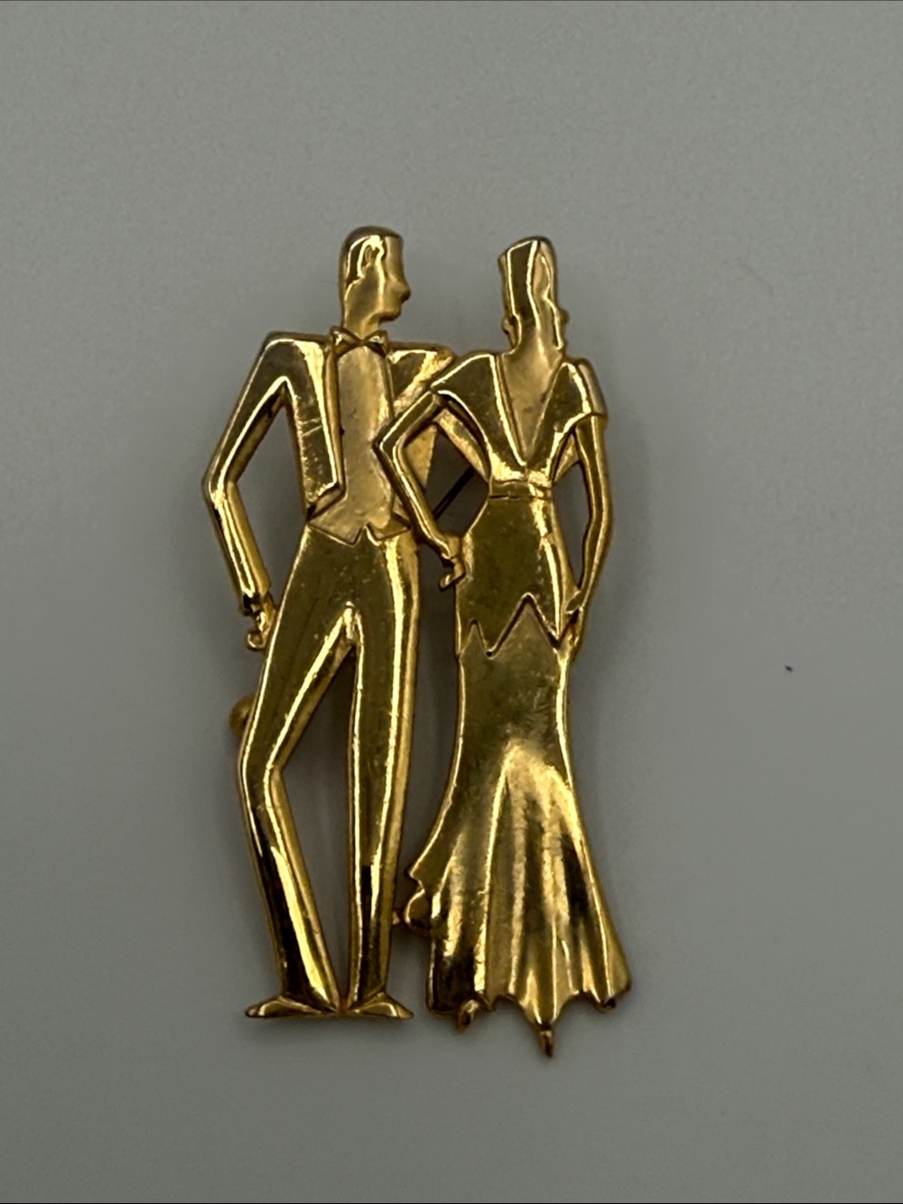 Vintage 1988 Art Deco style gold-tone figural couple brooch by Jonette Jewelry